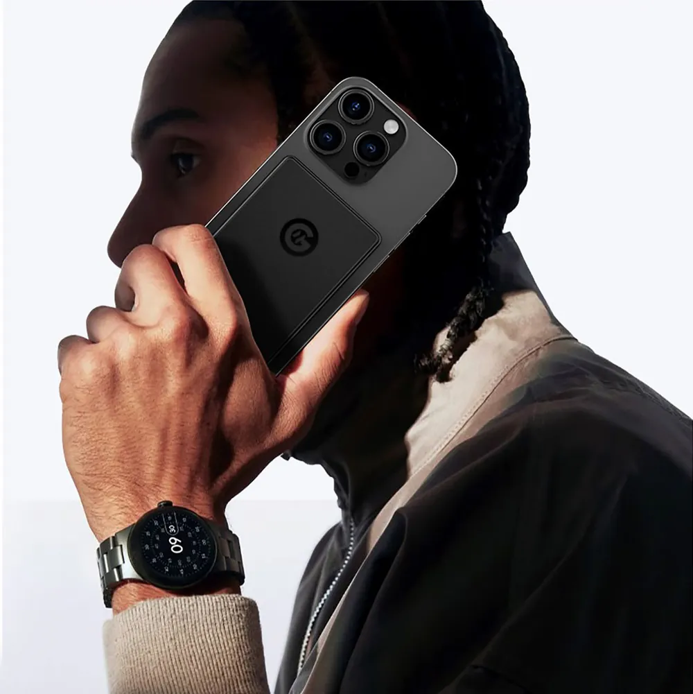 Person on a call with MagFusion Air attached to their phone