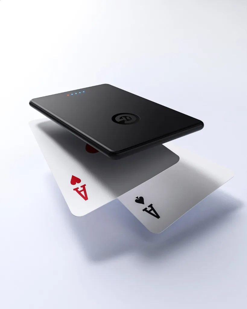 MagFusion Air shown beside playing cards to illustrate its thin profile